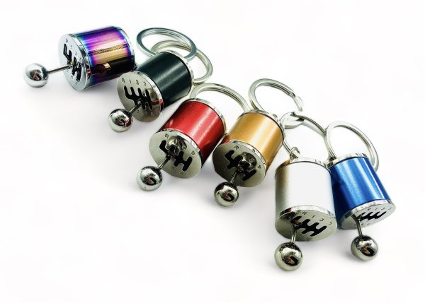 6 RODZAJÓW BRELOKÓW PRZEDSTAWIAJĄCYCH RÓŻNOKOLOROWE SKRZYNIE BIEGÓW ZAWIERAJĄCE RUCHOMĄ GAŁKE DO ZMIANY WSZYSTKICH BIEGÓW. IDEALNE NA PREZENT!