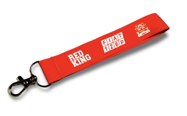 WYTRZYMAŁA SMYCZ DO KLUCZY Z OBRYSEM SŁYNNEGO MALUCHA – FIAT 126P „RED KING” W KOLORZE CZERWONYM. KOLEKCJA PRL. IDEALNA DLA FANATYKÓW POLSKIEJ RETRO MOTORYZACJI.
